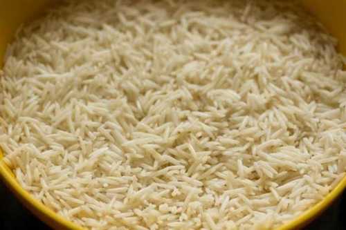 Organic Medium Grain Biryani Rice - Soft White Texture | High In Protein, Fresh Quality, No Drying, 99.9% Purity, Current Crop Year, Solid Form, Origin: India, 12 Months Shelf Life