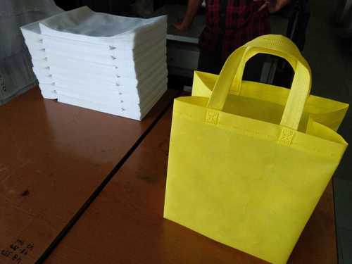 Yellow Non Woven Loop Handle Bag