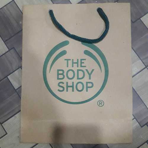 Eco-Friendly Brown Paper Carry Bag - Customized Size with Flexiloop Handle | Good Quality, Lightweight, Easy to Carry, Disposable, Recyclable Designs