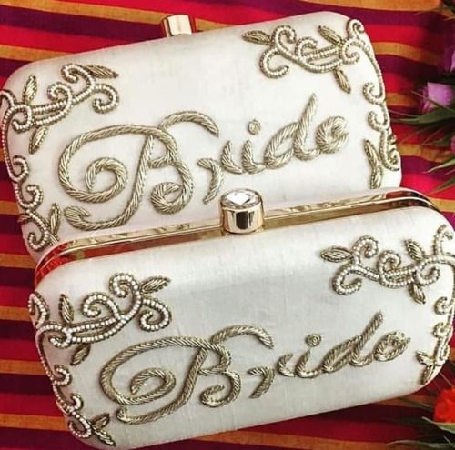 Complete your wedding day look with these bridal purse options