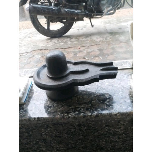 Polishing Black Marble Shivling Statue