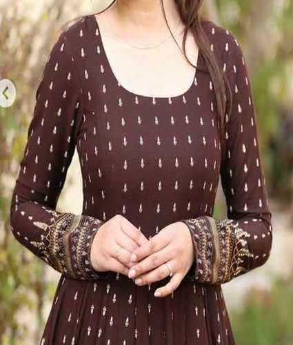 Brown Ladies Gold Printed Long Gown With Deep Back Designs With Tussles