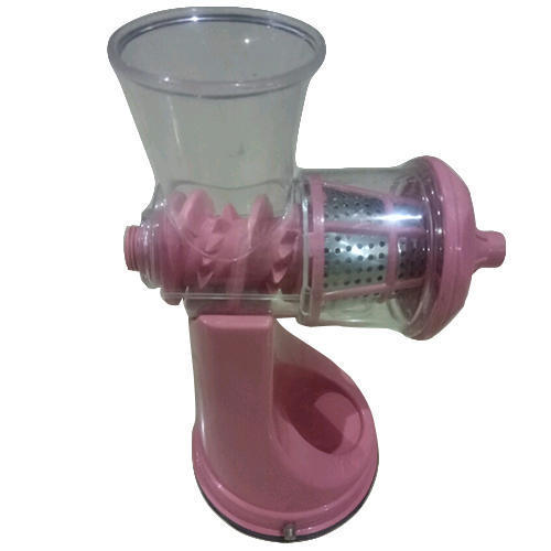 Pink And Transparent Plastic Hand Fruit Juicer