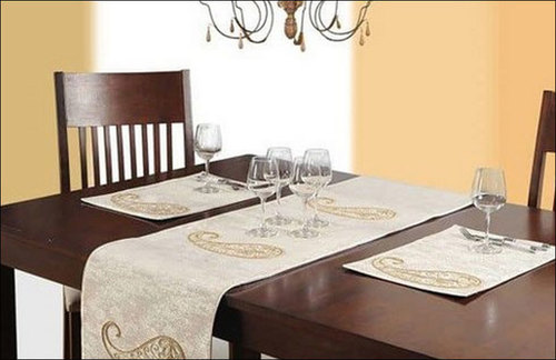 White Rectangular Table Mats And Runner