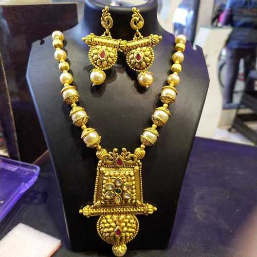 Golden Artificial Marwadi Necklace Set With Kundan And Moti Work