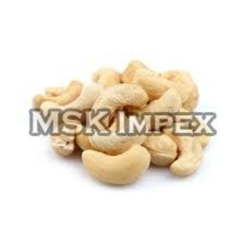 A Grade Cashew Nuts - Anacardium Occidentale, Dried Processing, 553 Calories | Raw, Curved Shape, White Color, High Protein, Low Sodium