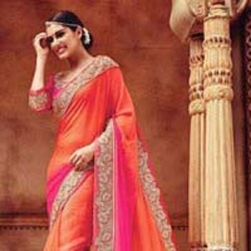 Various Colors  Are Available Snazzy Orange Georgette On Net Designer Saree