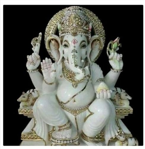 Lord Ganesha White And Golden Statue