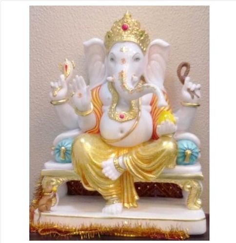 Lord Ganpati White And Golden Statue