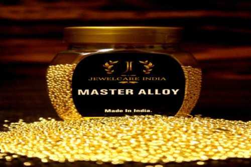 प्लास्टिक की बोतल में गोल्डन गोल्ड अलॉय