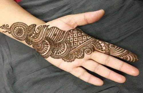 Close-up of indian bridal hands with henna tattoo. AI Generated. 30472499  Stock Photo at Vecteezy