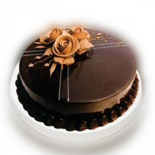 Delicious And Really Healthy For Heart And Rich In Protein Brown Chocolate Cake With Creamy Yellow Rose 