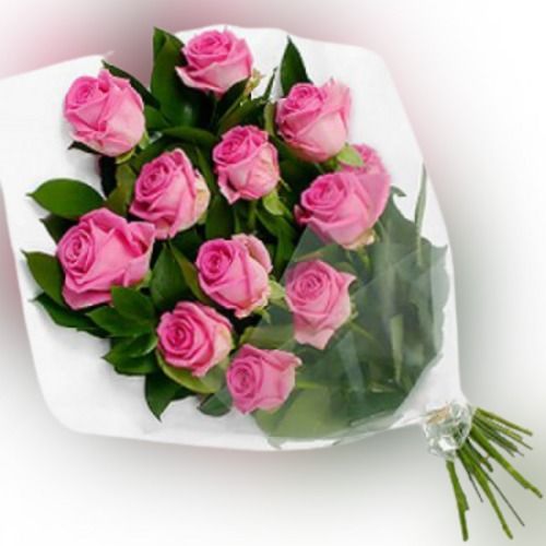 Natural Fresh Pink Roses Creatively Bunched Together For Gifting To Someone Special