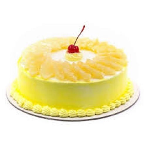 1/2 Kg Pineapple Cake and New Year Greeting Card @ Best Price |  Giftacrossindia