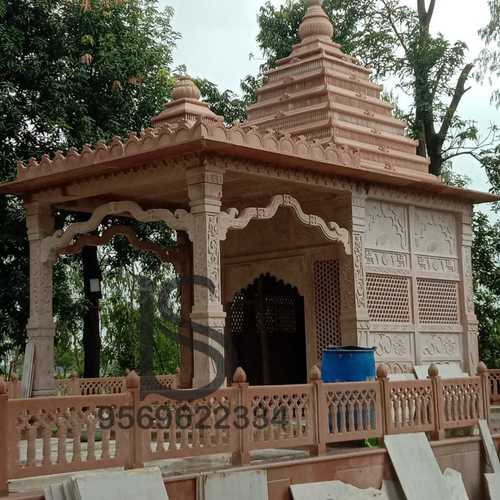 नक्काशीदार गुलाबी बलुआ पत्थर का मंदिर