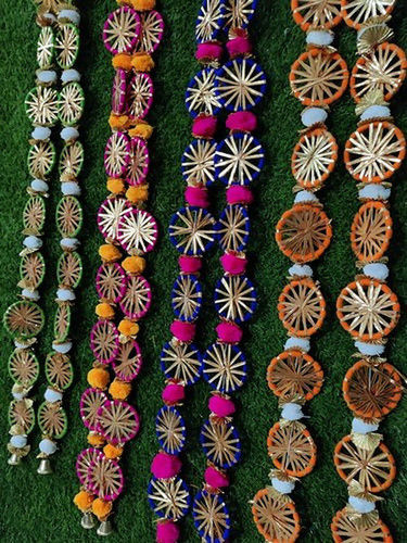 Handmade Rings And Pom Pom Wall Hangings