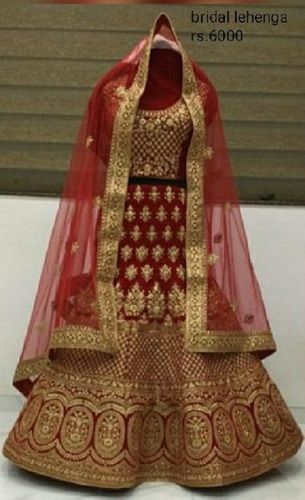 red and golden beautiful and gorgeous smart fit skin friendly ladies fancy embroidered silk bridal lehenga choli 746