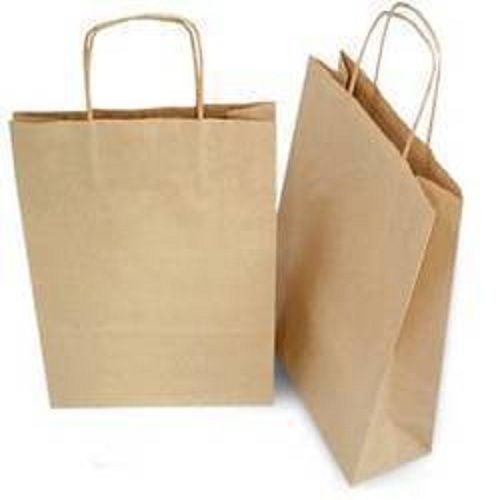  शॉपिंग के उपयोग के लिए प्लेन इको-फ्रेंडली ब्राउन कलर डिस्पोजेबल पेपर कैरी बैग 