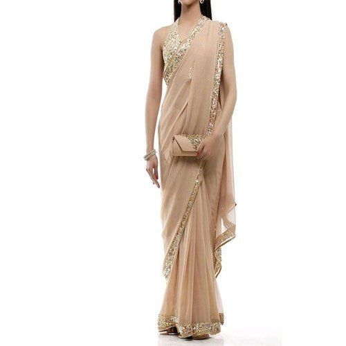 Beige 6 Meter Embroidered Party Wear Fancy Ladies Lehenga Saree With Blouse Piece