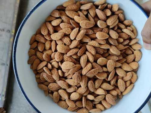 Brown Natural Sun Dried Almonds Used In Milk And Sweets