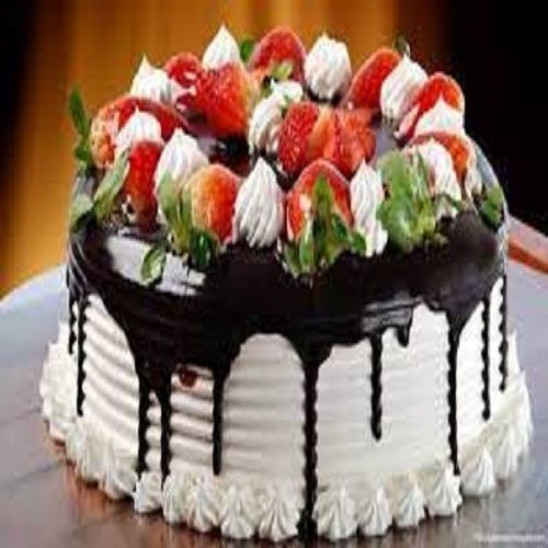 Yummy And Creamy Chocolate Cake With Strawberry Toppings