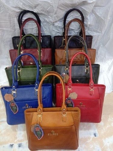 Comes In Various Colors Rectangular Shape Very Spacious And Light Weight Zipper Closure Ladies Leather Handbag