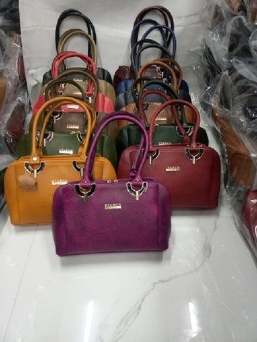 Comes In Various Colors Rectangular Shape Very Spacious And Light Weight Zipper Closure Plain Ladies Soft Leather Handbag