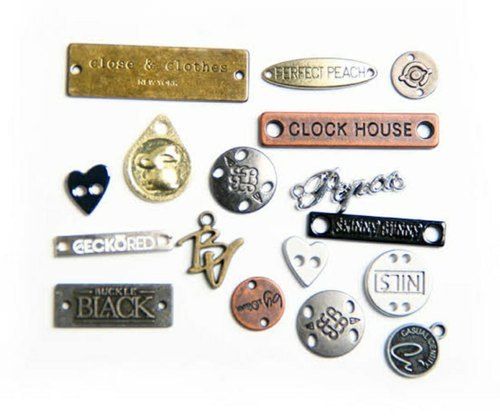 Designer Zinc Metal Badges For Garments With Coated Finish And Various Shapes