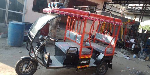 Three Wheel Type Six Seater Battery Operated Red And Black Marco Rickshaw