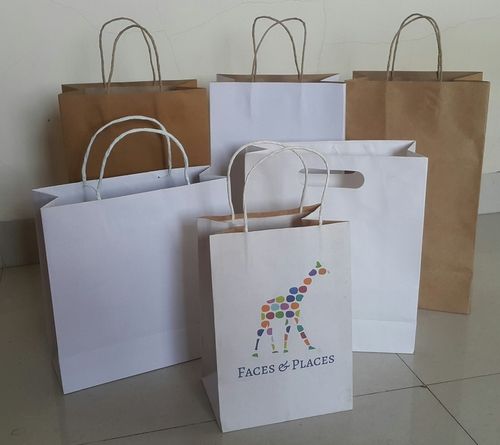 White Plain And Printed Design Kraft Paper Bags With Rope Handles For Shopping Purpose