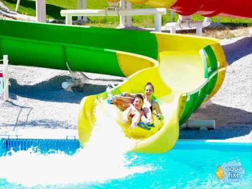 Green And Yellow Color Open Float Slide, Rider Capacity 120 To 240 Person/Hour Length: As Per Custuomer  Meter (M)