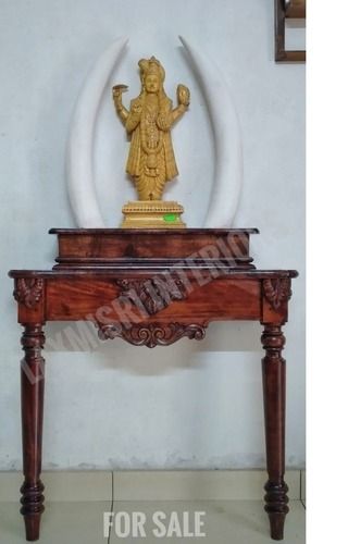 Brown Colour Wooden Console Table With Elephant Trunk On The Corners As Design