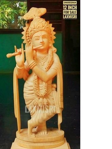 Eco-Friendly Hand Crafted Beautiful Designed Wooden Statue Of Lord Krishna In Cream Colour