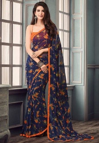 Party Wear Skin Friendly Ladies Denim Blue And Orange Printed Saree With Blouse Piece
