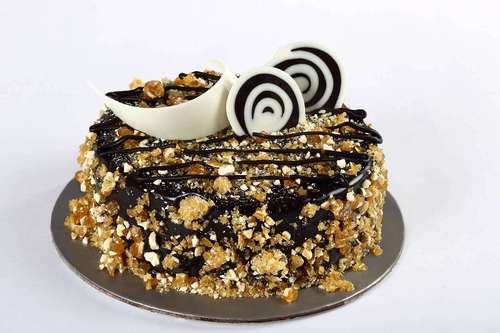 Chocolate Nougatine Cake With Chocolate Sponge Top With A Rich Creamy Chocolates Filling And Cover