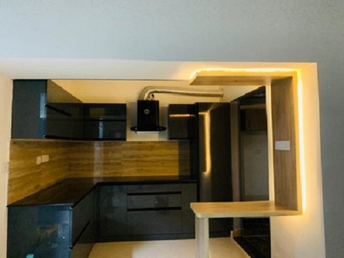 Modern Designer L Shaped Modular Kitchen Cabinet Designing Services By Space Modulars and Designs