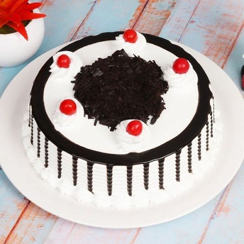 Four Layered Black Forest Treat Chocolate Cake With Amazing Texture With Whipped Cream