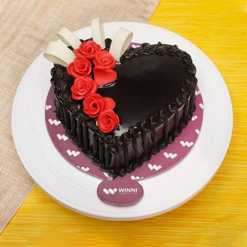 Heart Shape Toothsome Chocolate Cake With Icing Covering Yummy Flavor