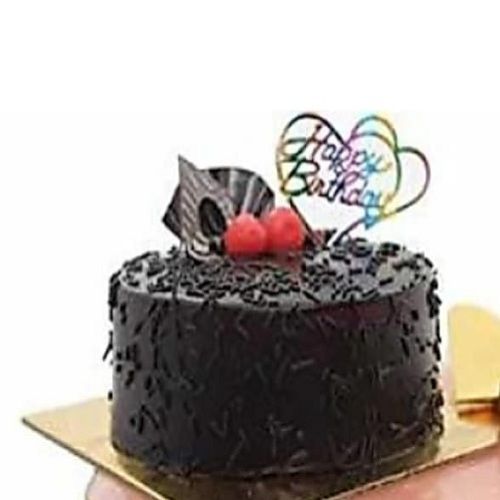 Chocolate Delicious And Creamy Cake With Cherry And Choco Chip Topping