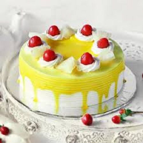 Cream Delicious And Mouth Melting Pineapple Cake With Cherry Toppings