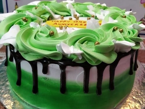 Green And White Cake For Birthday And Anniversary