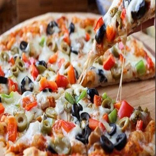 100% Fresh And Delicious Pizza With Mozzarella Cheddar, Basil And Tomato