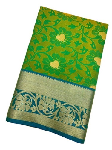 पारंपरिक एलिगेंट और सुंदर डिज़ाइन वाली हरे रंग की प्रिंटेड सिल्क साड़ी हैवी ज़री बॉर्डर वर्क के साथ