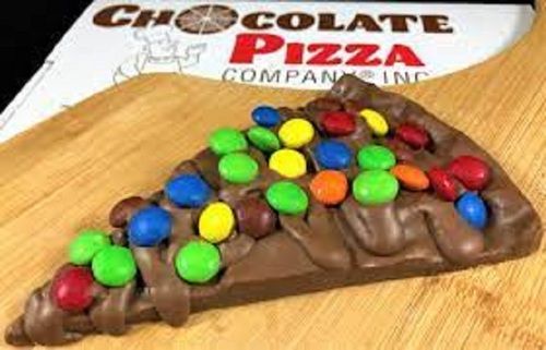 Delicious Tasty Brown Chocolate Pizza Topped With Colourful Chocolates