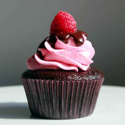 Delicious And Tasty Special Dark Chocolate Cup Cakes With Strawberry Topping