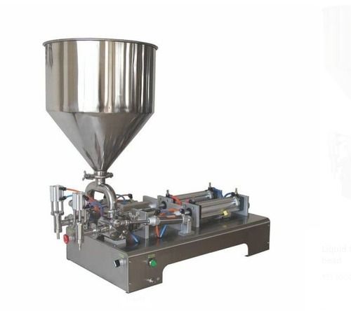 Semi Automatic Double Head Liquid Filling Machine, 220V For 50Ml To 500Ml Sealing Application: Beverage