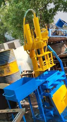 Blue And Yellow Colour Manual Operated Cement Brick Making Machine Warranty: 1 Year