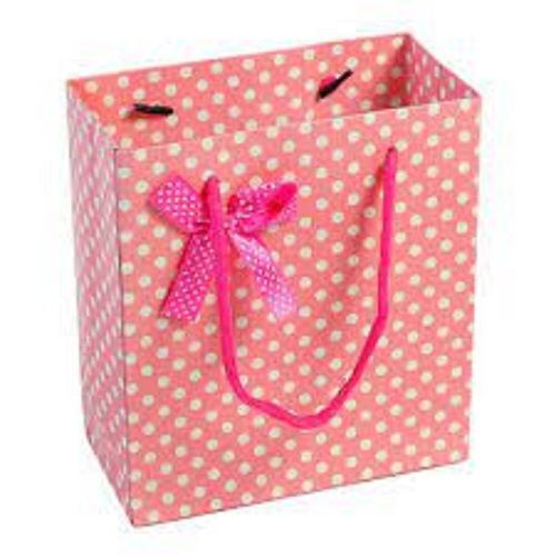 Highly Durable Light Weight Pink Color Dot Printed Paper Bag For Gifting Purpose 