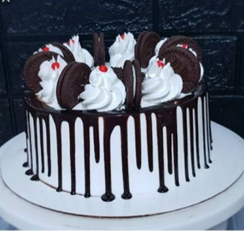 Appealing Look Mouthwatering Taste Round Chocolate Truffle Cake With Cream Biscuit