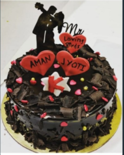 Couple drawing cake (Human) | Cake Stop 1 Pty Ltd